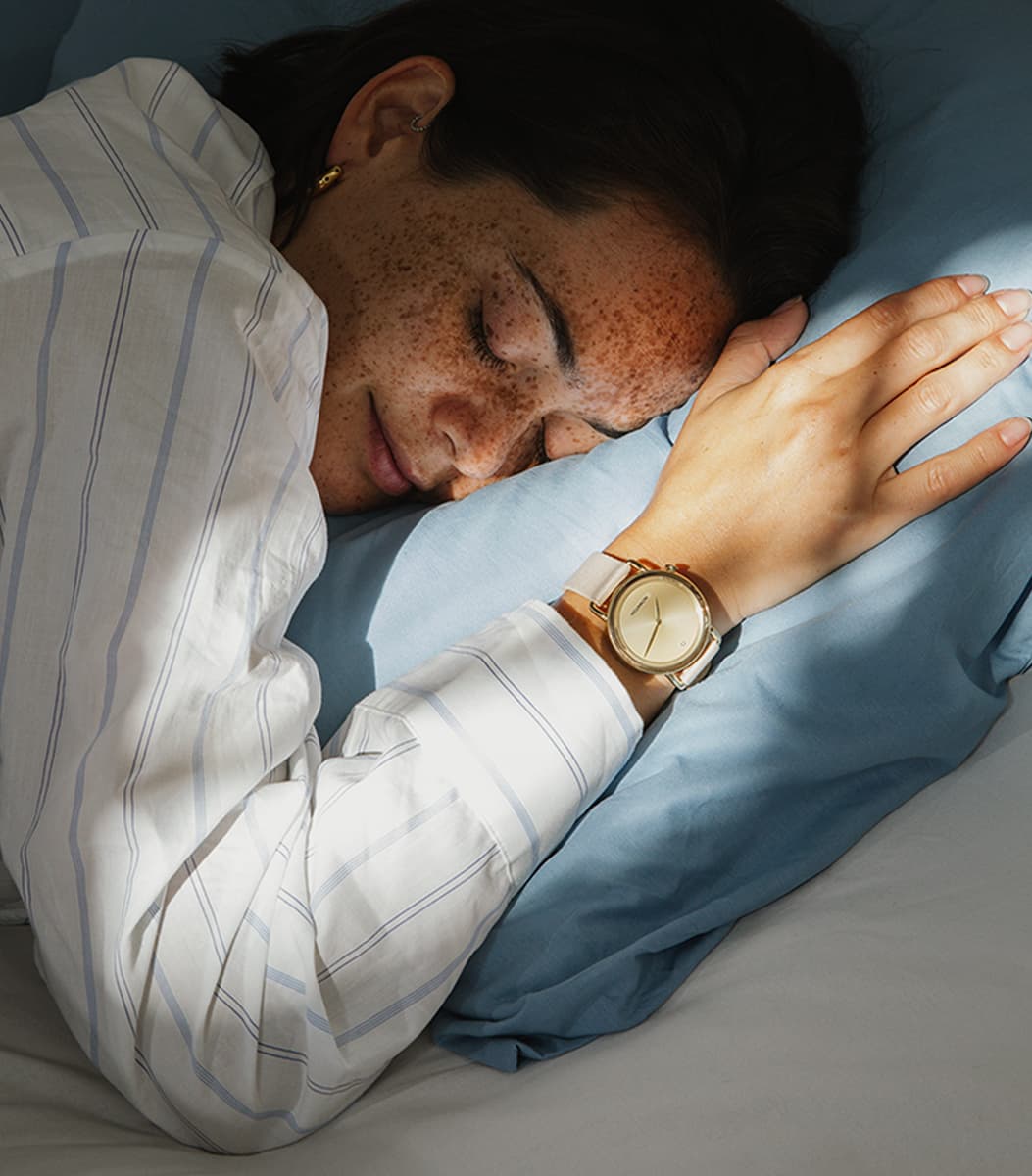 Sleeping woman wearing the NOWATCH